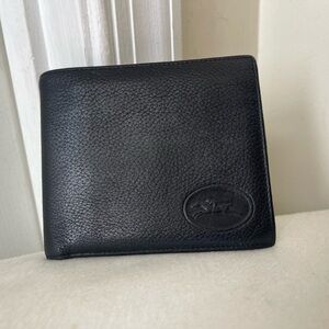 Longchamp Black Pebbled Leather Wallet with Embossed Logo